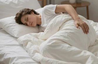A person lying on a weighted blanket on a bed, showing a subtle expression of discomfort or back pain, with the blanket visibly weighted and slightly unevenly distributed, set in a cozy bedroom environment with soft lighting, no text or symbols in the image
