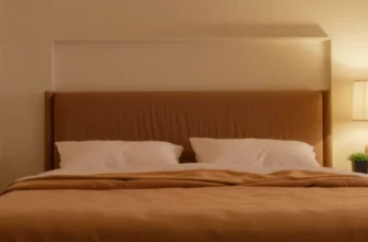 A cozy bedroom interior featuring a neatly made bed with a plush weighted blanket draped over the mattress, soft ambient lighting, and a calm, inviting atmosphere