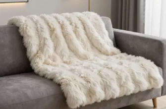 A luxurious faux fur weighted blanket draped over a modern sofa, with soft ambient lighting, showcasing its plush texture and subtle weight distribution, in a stylish living room setting