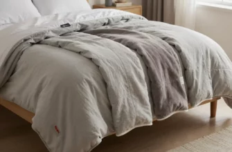 A cozy bedroom scene featuring a Meijer weighted blanket draped over a neatly made bed, placed beside two other popular weighted blankets of similar size, all displayed side by side to highlight their textures, colors, and stitching, with soft natural lighting and a warm, inviting atmosphere, no people or text present