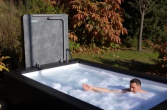 A modern cold plunge pool in a serene outdoor setting with a person stepping into icy water, surrounded by autumn foliage, capturing the chill vibe of October