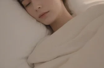 A child peacefully sleeping under a weighted blanket on a comfortable bed. Soft, warm lighting in the room. Focus on the child's serene expression and the gentle texture of the blanket.