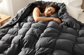 A person comfortably sleeping under a high-quality weighted blanket on a cozy bed in a bedroom. Soft lighting, focus on the blanket's texture and the person's relaxed posture.