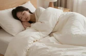 A cozy and inviting bedroom scene with a person peacefully sleeping under a weighted blanket. The room is softly lit, with warm colors and comfortable furniture. Focus on the texture of the blanket and the feeling of relaxation.