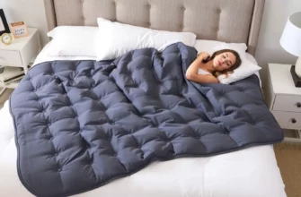 A cozy bedroom scene featuring a neatly made bed with a Zonli weighted blanket cover draped over it, showcasing its soft texture and even weight distribution, alongside a person comfortably resting under the blanket, highlighting relaxation and comfort