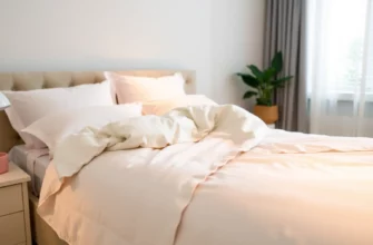 A serene bedroom scene featuring a neatly made bed with a soft, white 100% cotton weighted blanket draped over it, gentle ambient lighting, and subtle natural elements like a potted plant or open window with daylight, emphasizing calm and restful sleep
