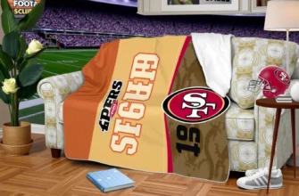 A cozy living room scene featuring a 49ers-themed weighted blanket draped over a plush sofa, with subtle hints of a football stadium in the background, a 49ers football helmet resting on a side table, and a warm, inviting atmosphere that conveys comfort and fandom