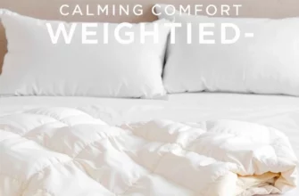 A clean, minimalist product display of a Sharper Image Calming Comfort Weighted blanket, showing its soft fabric texture, gentle color palette, and subtle weight distribution, arranged on a serene bedding setup with calming lighting to emphasize comfort and relaxation